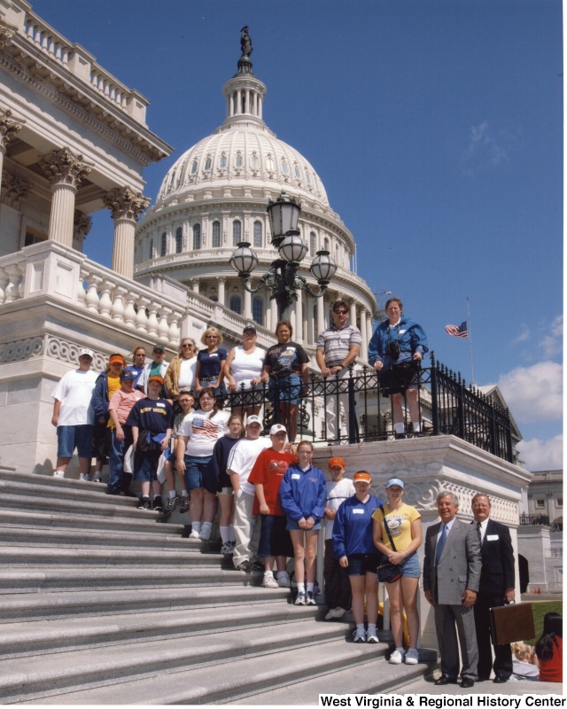 Congressman Nick Rahall (D-WV) with unidentified Webster Springs Elementary School students in front of the United States Capitol building.