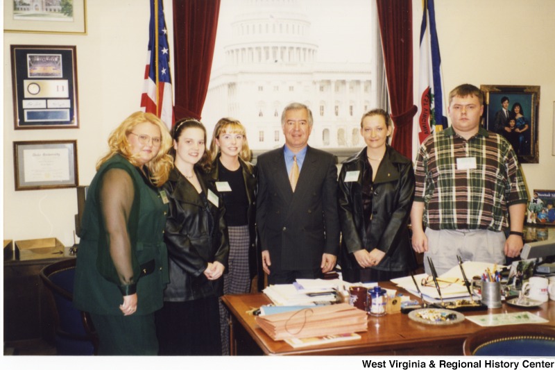 Congressman Nick Rahall (D-WV) with four unidentified women and one man in his D.C. office.