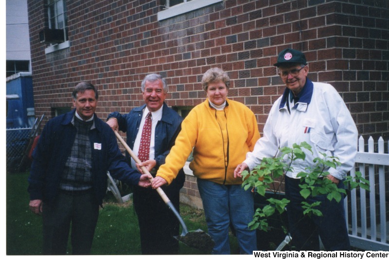 From left to right: Harold Hayden, Congressman Nick Rahall (D-WV), Caroll Wylie, and Jack Feller planting a tree at Mullens Dogwood Festival.