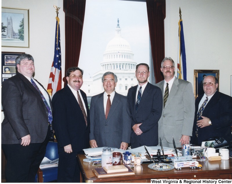 Congressman Nick Rahall (D-WV) with five unidentified men in his D.C. office.