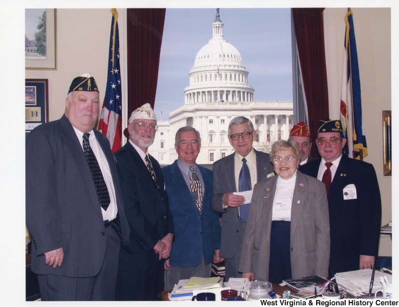 Congressman Nick Rahall (D-WV) with a group of unidentified veterans in his D.C. office.