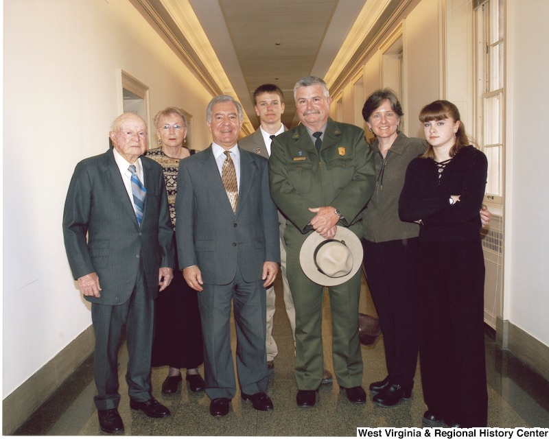 Congressman Nick Rahall (D-WV) with an unidentified park ranger and group of people.