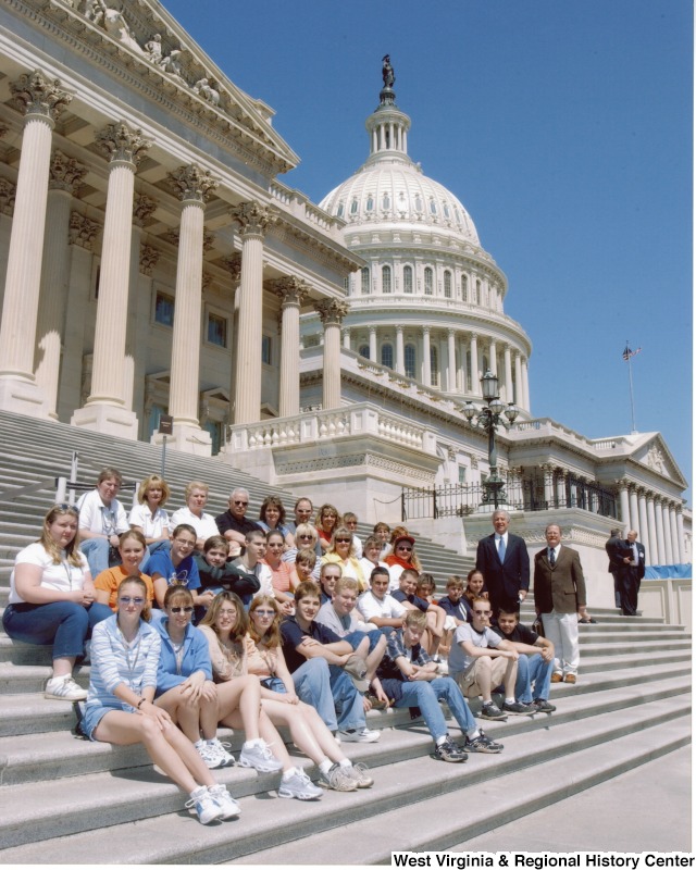 Congressman Nick Rahall (D-WV) with unidentified Webster Springs Junior High students in front of the United States Capitol building.
