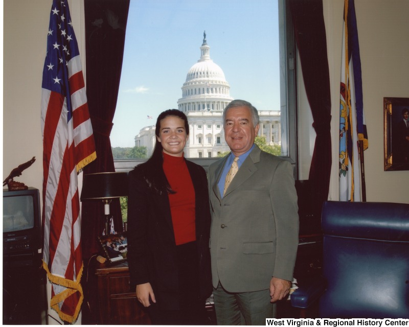 Congressman Nick Rahall (D-WV) with an unidentified woman in his office.