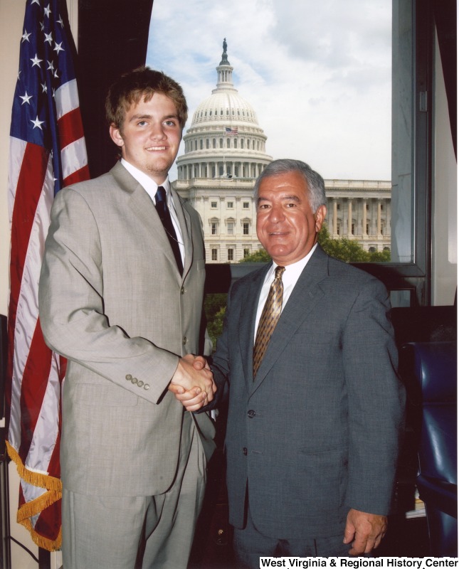 Congressman Nick Rahall (D-WV) with an unidentified man in his D.C. office.