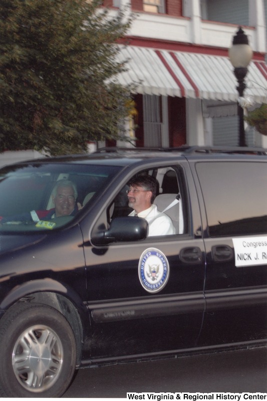 Congressman Nick Rahall (D-WV) in a United States Congress vehicle with an unidentified man.