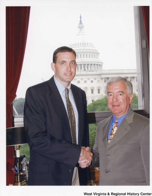 Congressman Nick Rahall (D-WV) with an unidentified man in his D.C. office