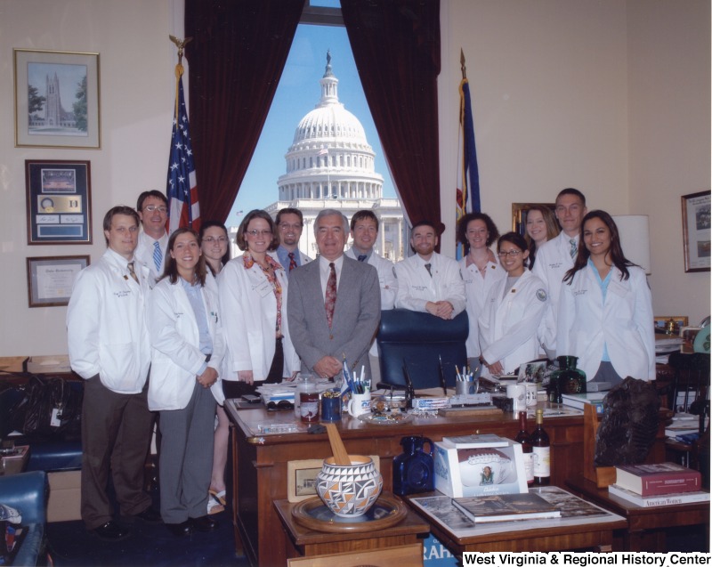 Congressman Nick Rahall (D-WV) in his office with an unidentified group of people from the American Association of Colleges of Osteopathic Medicine.