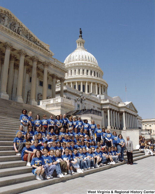 Congressman Nick Rahall (D-WV) with unidentified Bradley Elementary School students in front of the United States Capitol building.