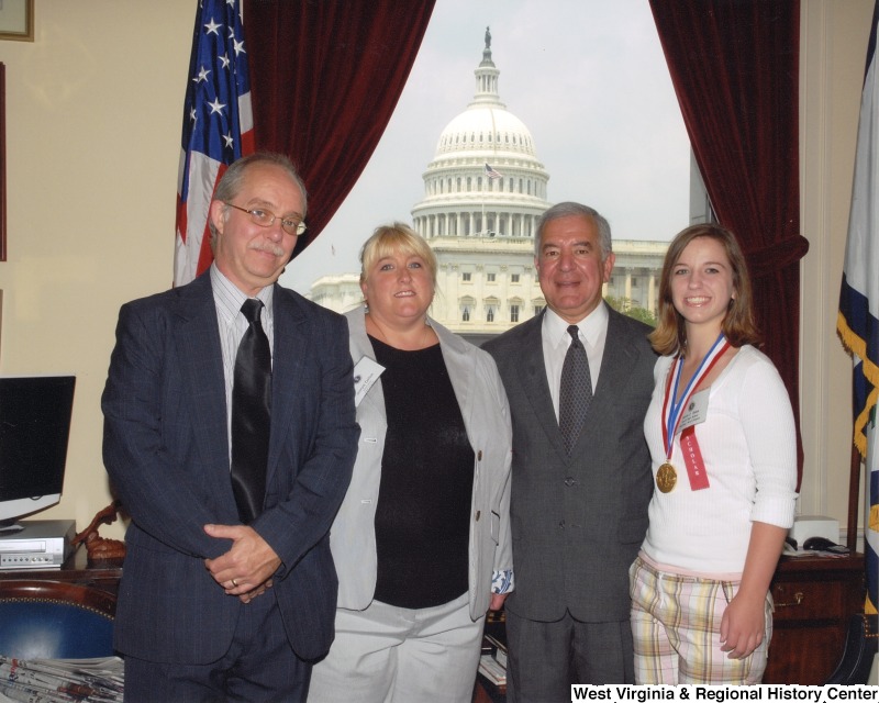 From left to right: Mr. Dolan, Sonya Dolan, Sarah Dolan, and Congressman Nick Rahall (D-WV).
