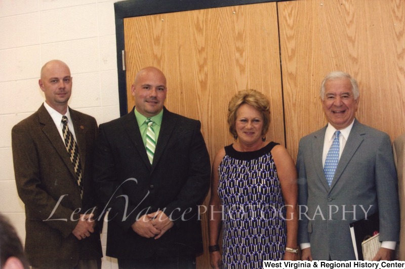Congressman Nick Rahall (D-WV) with three unidentified people at the City of Logan Mayor and Council Inauguration.