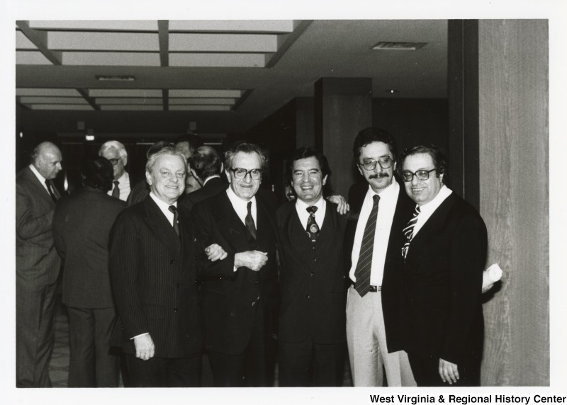 Congressman Nick Rahall (D-WV) with four unidentified men.