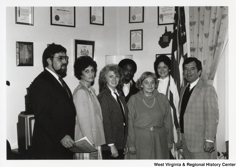 On the far right, Representative Nick J. Rahall (D-W.Va.) stands for a photograph with six unidentified people.