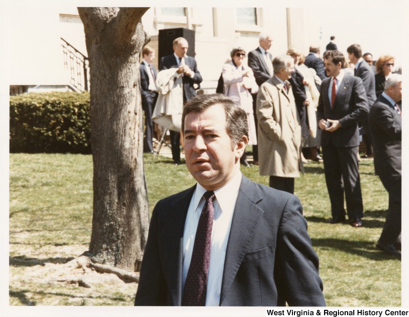 Representative Nick J. Rahall (D-W.Va.) is seen outside near a large crowd at Jim Howard's funeral.