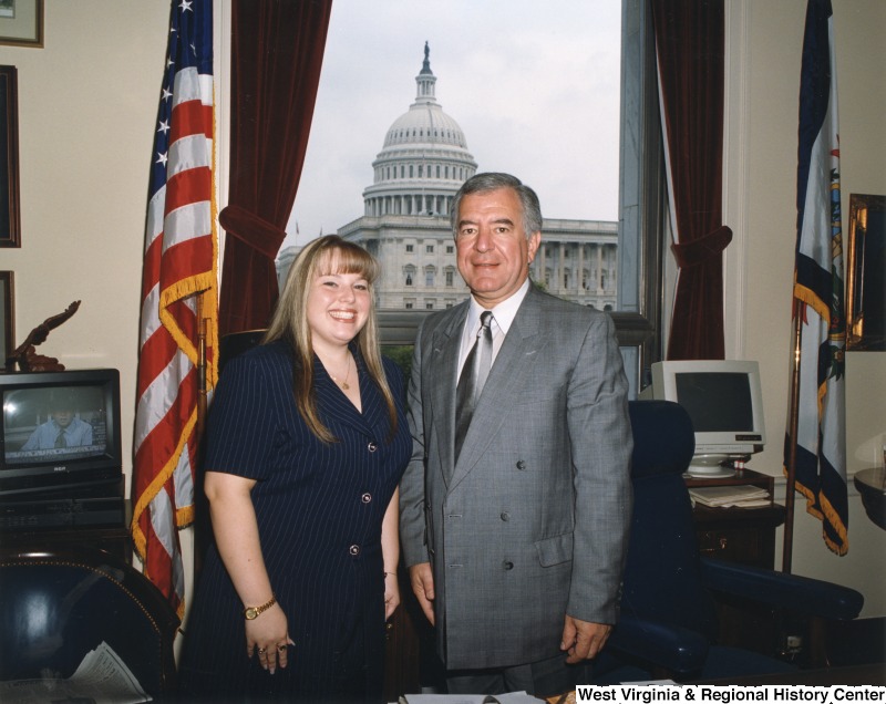 On the right, Representative Nick J. Rahall (D-W.Va.) stands for a photograph with Toni Muney.