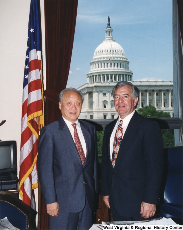 On the right, Representative Nick J. Rahall (D-W.Va.) stands for a photograph in his office with Chinese Ambassador Shunji Yanai.