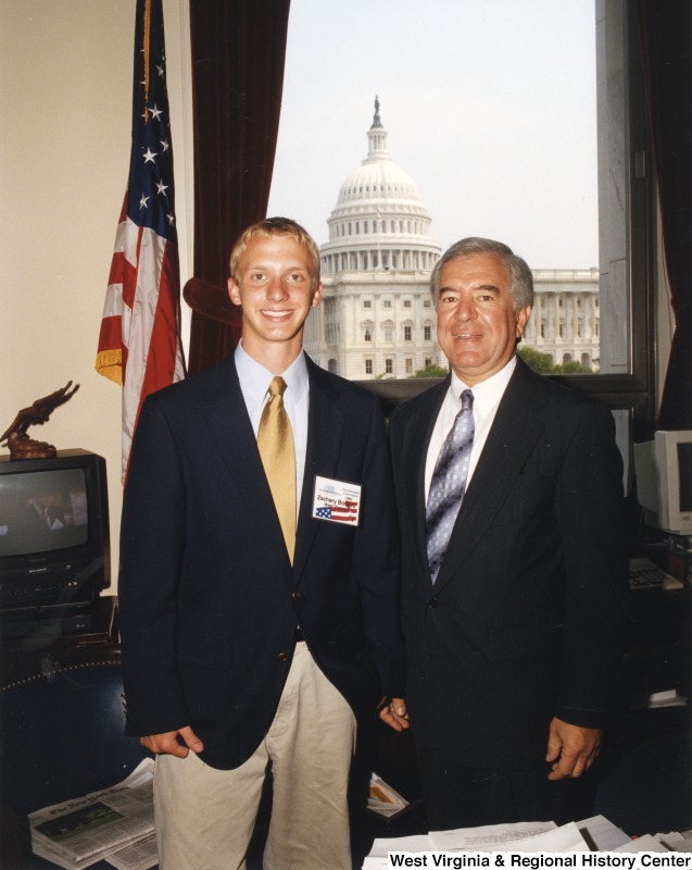 On the right, Representative Nick J. Rahall (D-W.Va.) stands for a photograph with Zachary Boileau.